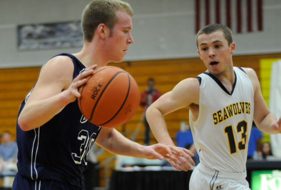 Davis Nicholson of SMCC defends UMA's Keith Chesley. Photo by Kim Lloyd.